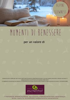 un libro e candele su una coperta